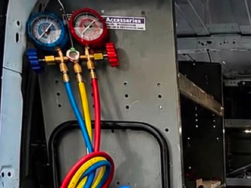 A/C manifold gauge set mounted in the Freitag Mechanic service van